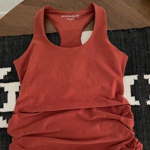 Beyond Yoga Grow and Glow maternity top. Rust colorway.